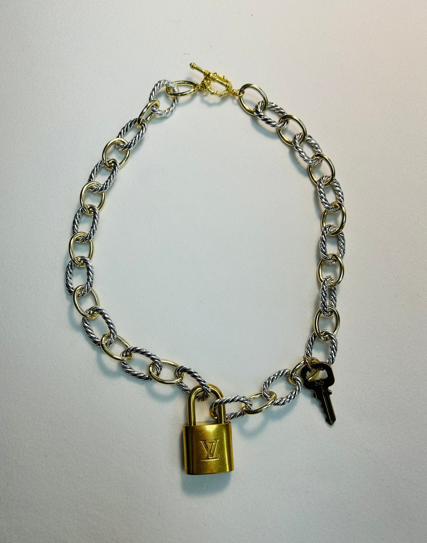 001- Authentic LV Lock Multi-Tone Plated Necklace