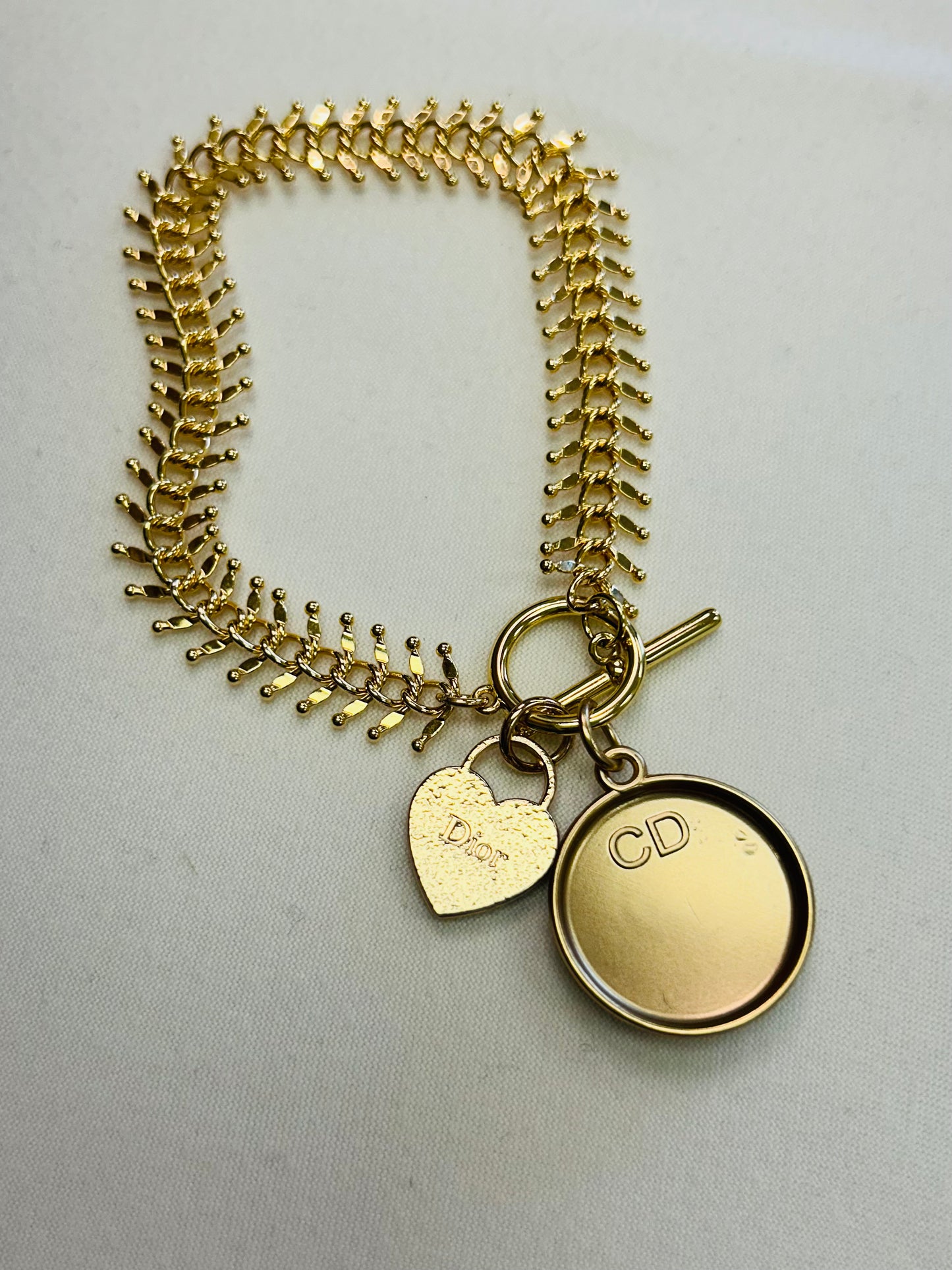 019- Authentic Dior Double Gold and Black Charm Bracelet