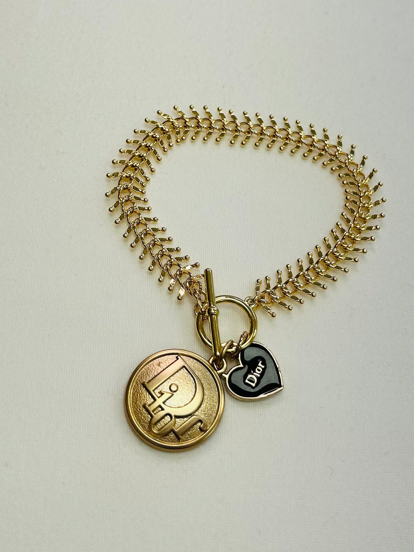 019- Authentic Dior Double Gold and Black Charm Bracelet