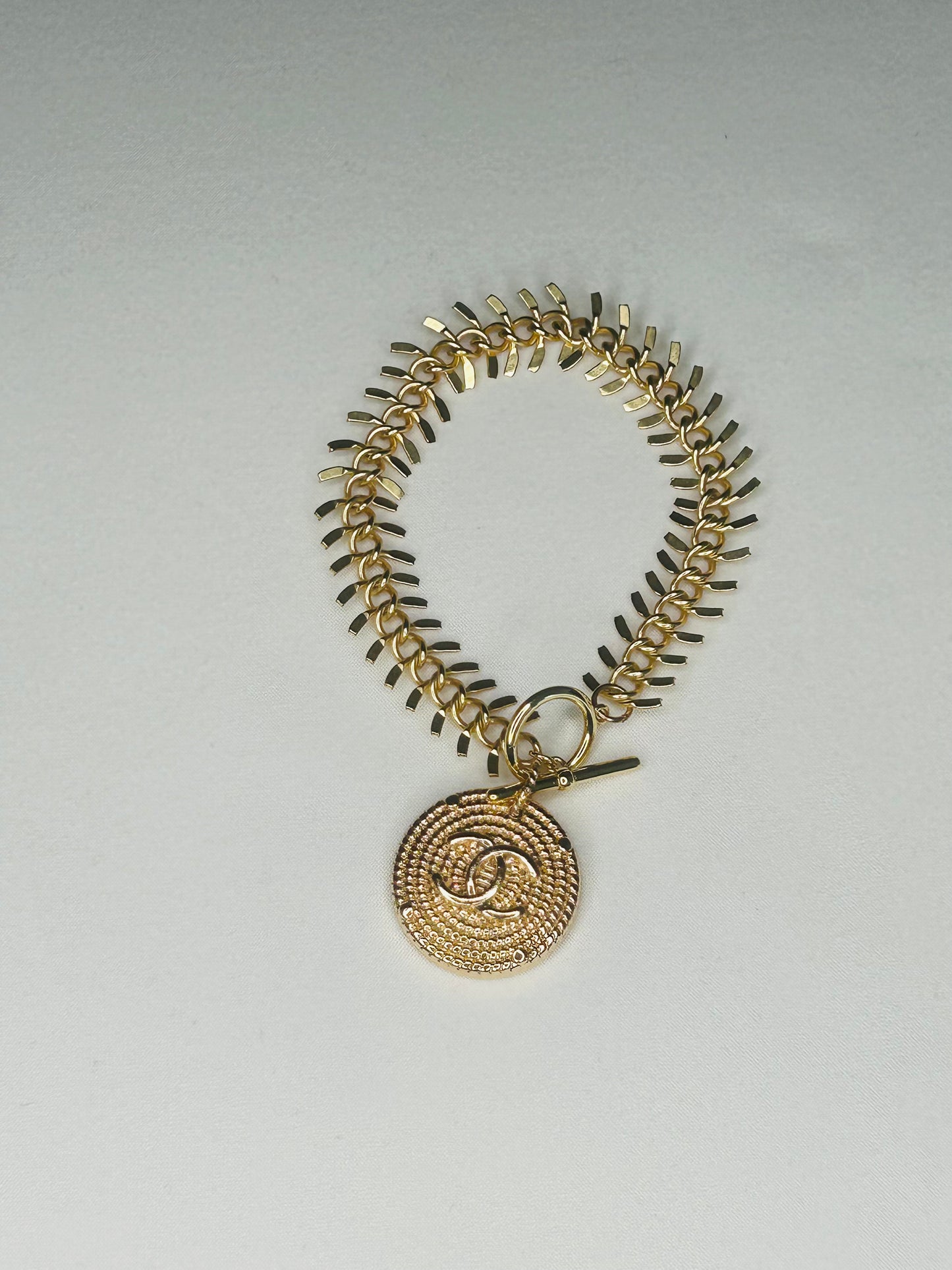 010- Authentic Large CC Gold Fishbone Bracelet