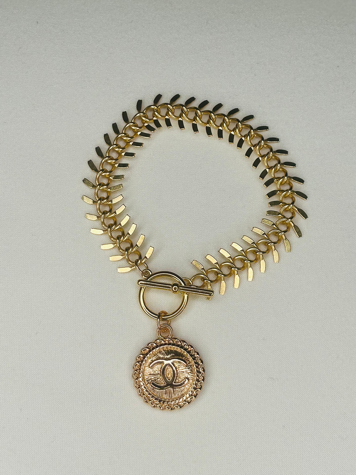 009- Authentic Small CC Gold Wishbone Bracelet