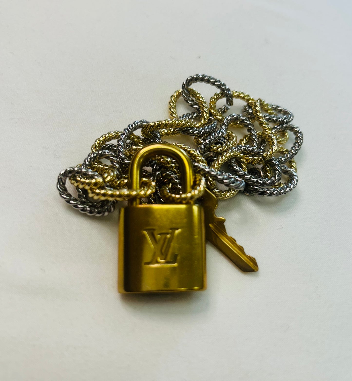 008- Authentic LV Lock Multi-Tone Single Strand Necklace